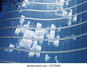 Glass Building With Cloud Reflections