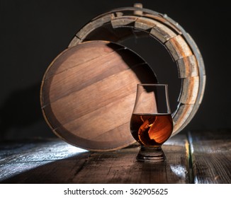 A Glass Of Calvados On An Oak Barrel