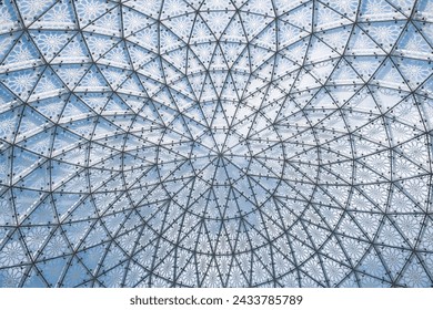 Glass ceiling in blue sky sunlight, abstract. Glass roof of the building. Geometrical ceiling, limpid round ceiling. Glass roof of the building over blue sky, transparent roof, skylight roof - Powered by Shutterstock
