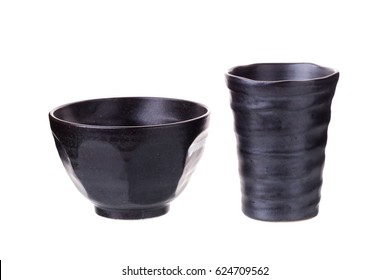 Glass ceramic black and black ceramic bowl on a white background