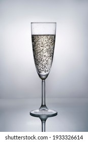 a glass of champagne, champagne bubbles