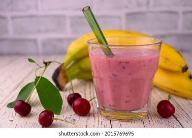 A Glass Of Cherry Banana Smoothie. Healthy Organic Food.