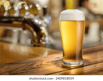 Glass of chilled beer on wooden bar table top and blurred bar interior at the background. - Powered by Shutterstock