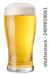 Glass of chilled light beer with beer foam head isolated on white background. Clipping path.