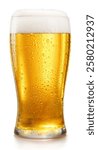 Glass of chilled light beer with beer foam head isolated on white background. Clipping path.