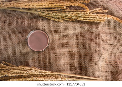 Glass Of Chocolate Malt Milk On Sackcloth, Top View