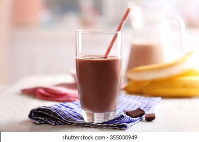 Glass Of Chocolate Milk On Table Close-up