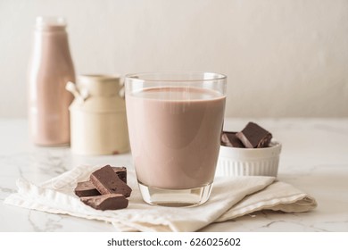 Glass Of Chocolate Milk On Table