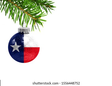 Glass Christmas ball toy isolated on white background with the flag State of Texas