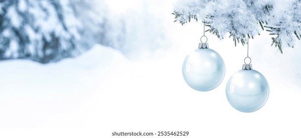 Glass Christmas baubles on a fir branch in front of a snowy blurred background - Powered by Shutterstock