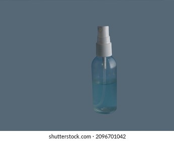 Glass Cleaning Bottle On Colored Background.