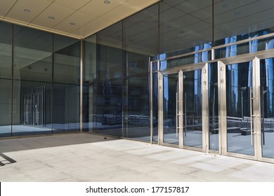 Glass closed doors of the entrance in modern building
