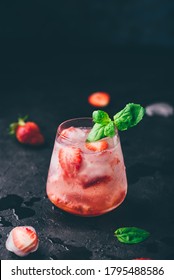 Glass Of Cocktail With Fresh Strawberry, Gin, Soda And Ice Cubes