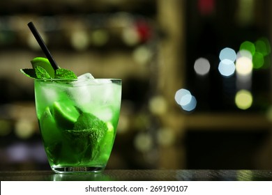 Glass Of Cocktail On Bar Background