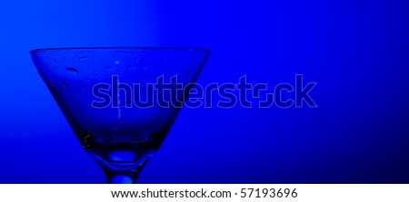 Glass cocktail on the blue background