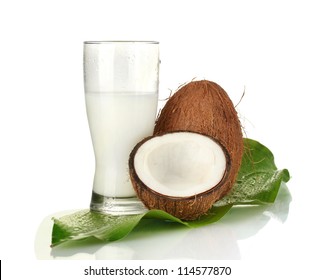 Glass Of Coconut Milk And Coconuts Isolated On White