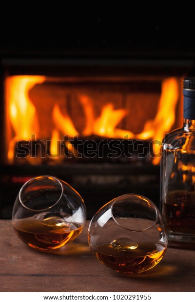 Glass Cognac Front Fireplace Stock Photo Edit Now 1020291955