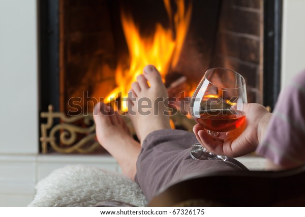 Glass Cognac On Background Burning Fireplace Stock Photo Edit Now