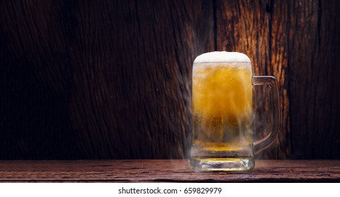 Glass Cold Beer On Wood Background With Copy Space