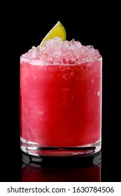 Glass Of Cold Cranberry Cocktail With Crushed Ice Isolated On Black