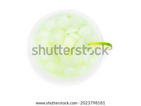 Glass of cold daiquiri cocktail on white background
