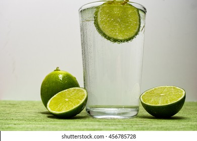 Glass With Cold Sparkling Mineral Water, Lime And Lemon, Seltzer