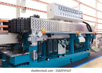 Glass conveyor line, Conveyor belt for production a window pane. Industrial equipment.