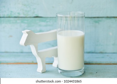 a glass of cow's milk and cow, the concept of gluten and village products