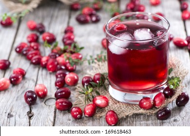 Glass With Cranberry Juice And Ice Cubes