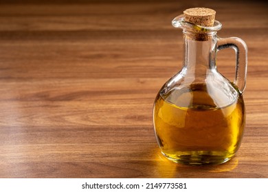 Glass Cruet. Olive Oil In A Glass Cruet.