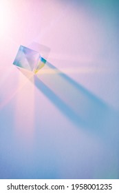 Glass Cube With Color Spectrum Rays. Abstract Background With Reflection And Refraction Of Light. Shadow And Rays Of Natural Light Effects.