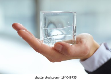 Glass Cube In The Hand