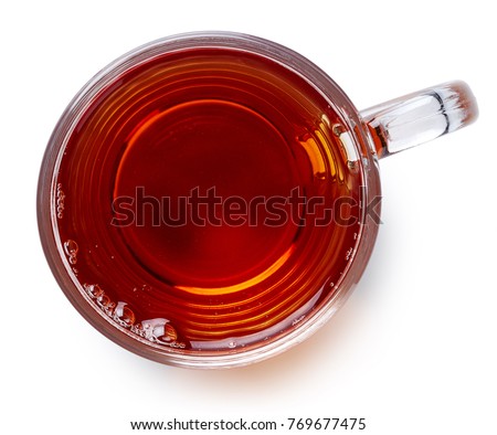 Glass cup of black tea isolated on white background. Top view