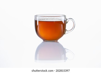 Glass cup of black tea on white background - Shutterstock ID 202815397