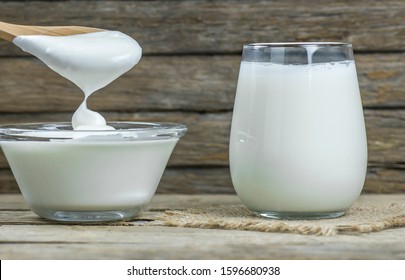 Glass Cup Of Turkish Traditional Drink Ayran , Kefir Or Buttermilk Made From Yogurt, Homemade Yoghurt In Glass Bowl On Rustic Table, Healthy Food