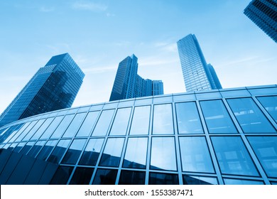 Glass curtain wall of skyscraper in financial center