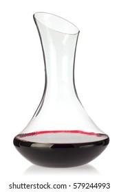 Glass decanter with organic red wine, isolated on white background.