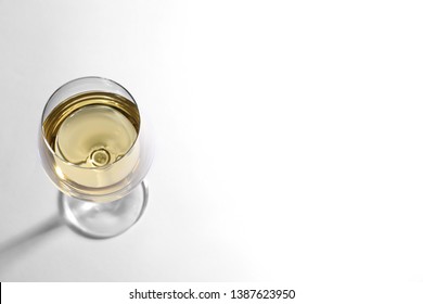 Glass Of Delicious Wine On White Background, Above View