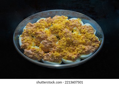 Glass Dish With Deviled Eggs, With Egg Yolk, Tuna And Pink Sauce