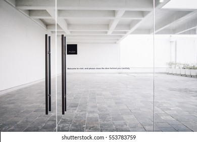 Glass door with welcome wording in the building