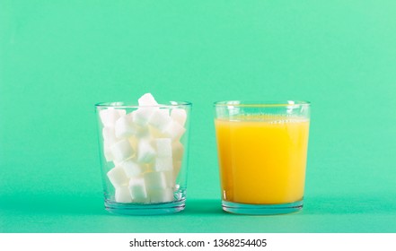 Glass Of Drink And Glass Of Sugar - Too Much Sugar Concept