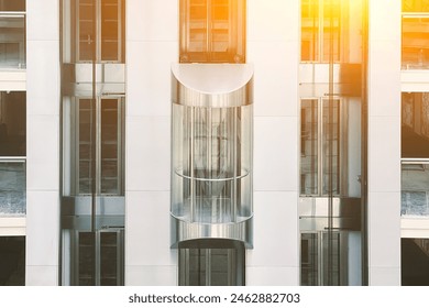 Glass elevator in a modern building, elevator in a business center - Powered by Shutterstock