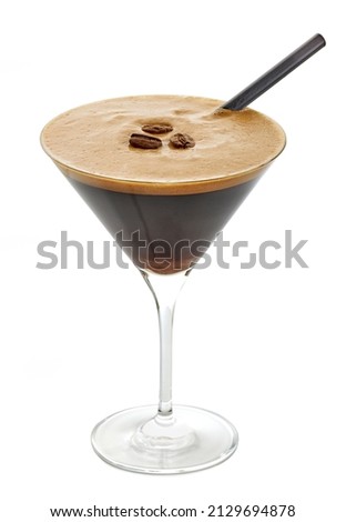glass of espresso martini cocktail isolated on white background