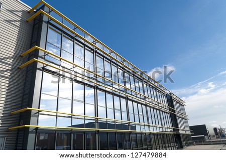 glass exterior of a modern office building