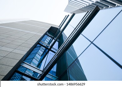 Glass facades of modern urban buildings are developing
