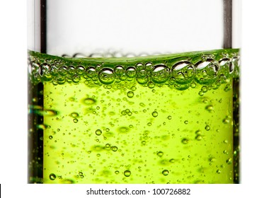 A Glass Flask With Green Liquid