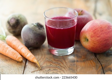 Glass Of Fresh Beetroot, Apple And Carrot Juice