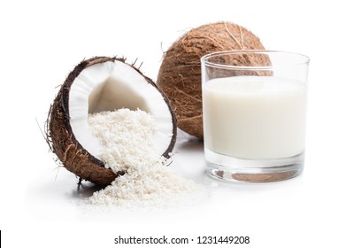 Glass  Of Fresh Coconut Milk And Flakes Isolated On White 