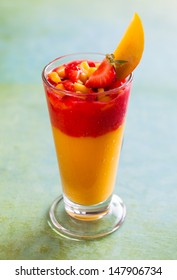 Glass Of Fresh Mango And Strawberry Smoothie