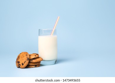 Glass of fresh milk and cookies on color background - Powered by Shutterstock